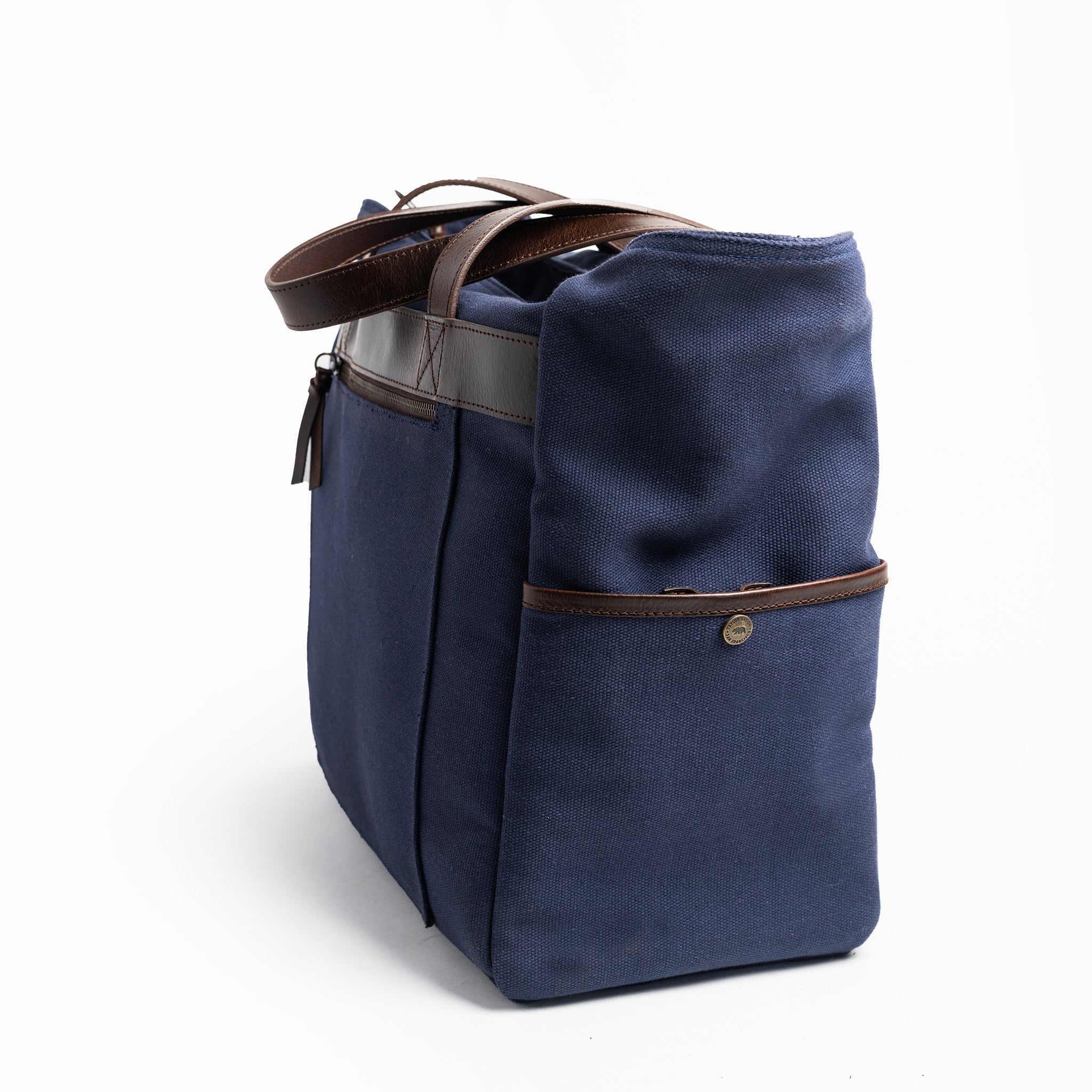 flatlay of The Utility Bag in Navy, from the side, Accessories by Taylor Stitch