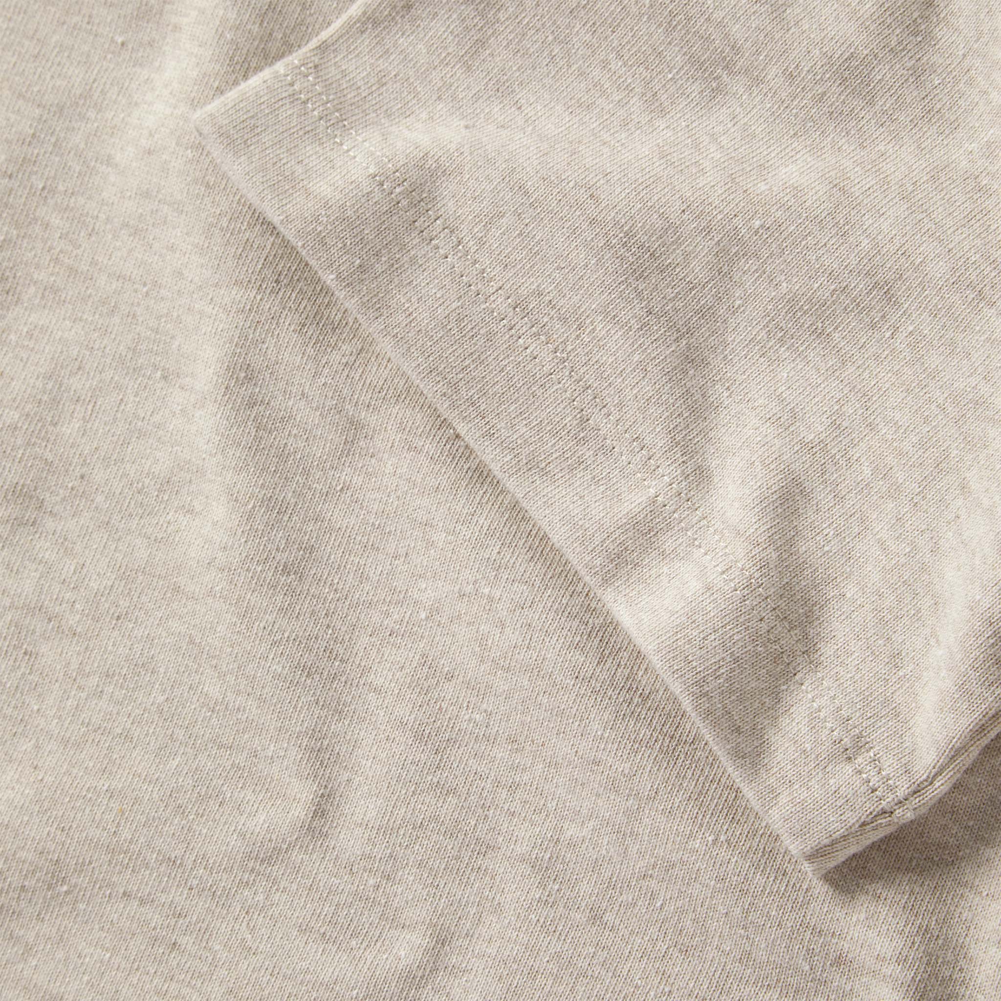 material shot of the sleeve on The Heavy Bag Tee in Oatmeal, Knits by Taylor Stitch