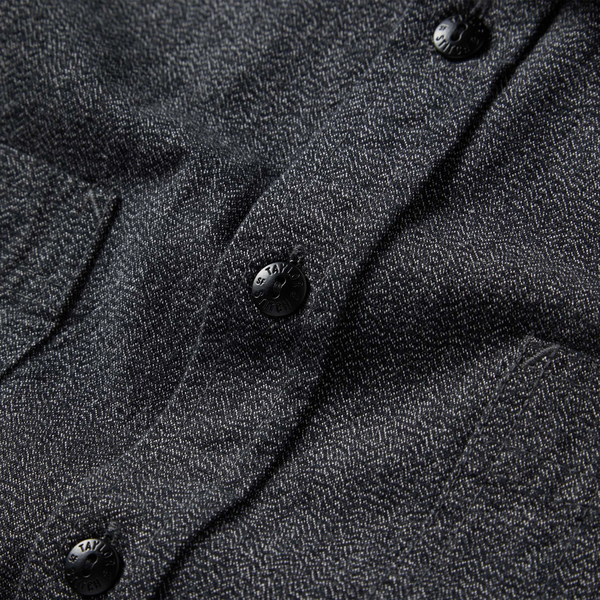 material shot of the buttons on The Utility Shirt in Ash Jaspe, Wovens by Taylor Stitch
