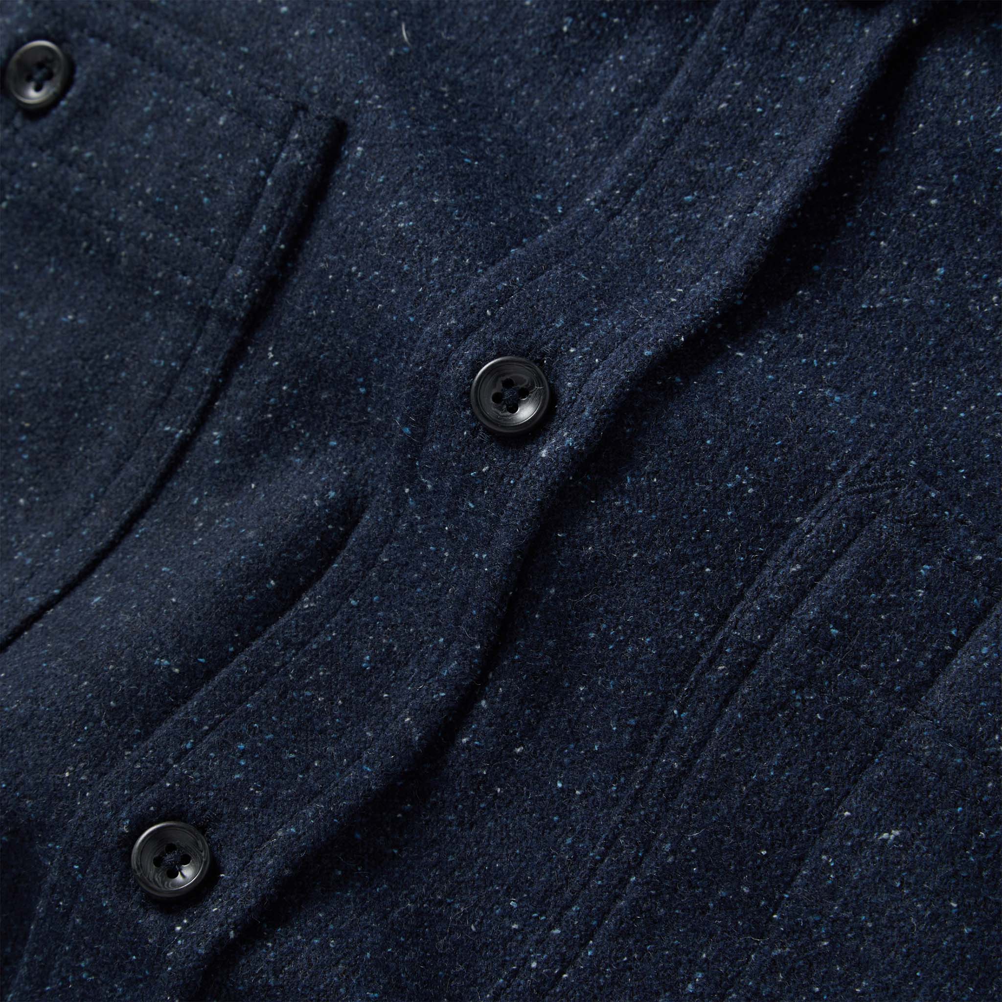material shot of the buttons on The Utility Shirt in Navy Donegal Wool, Wovens by Taylor Stitch