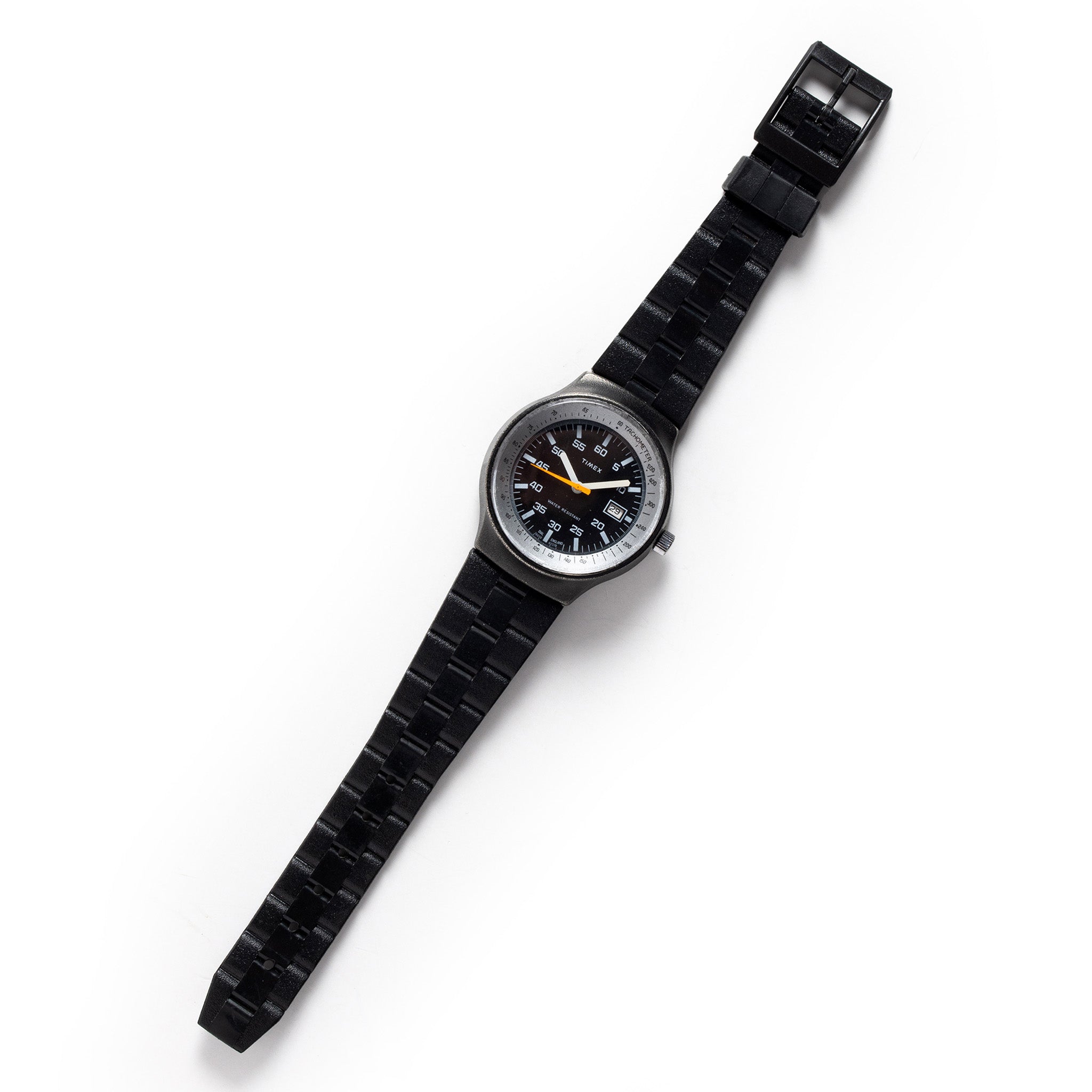flatlay of the 1978 Timex Black Max, Accessories by Taylor Stitch