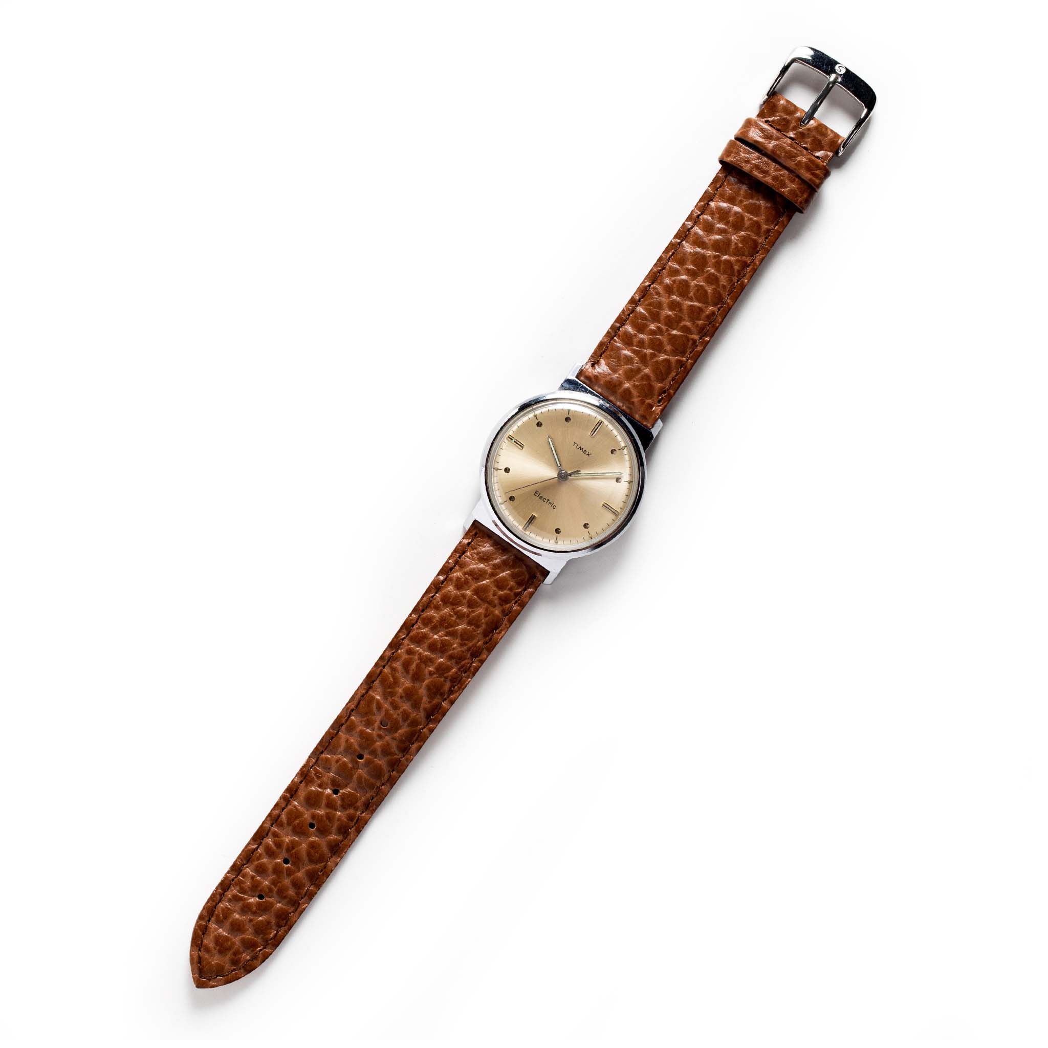 flatlay of The 1964 Timex Electric, Accessories by Taylor Stitch