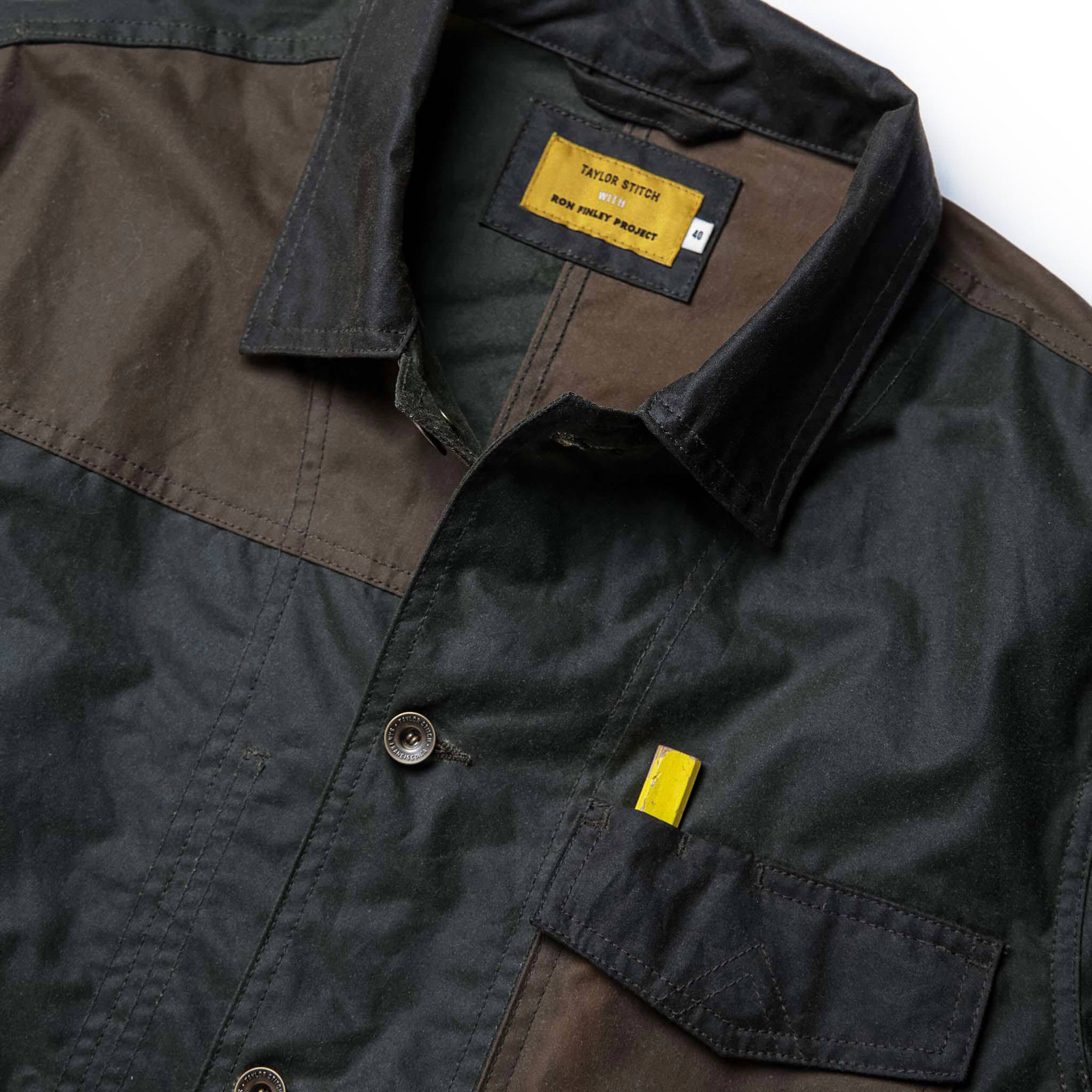 material shot of front collar of The Task Jacket in Waxed Khaki and Olive Patchwork, Outerwear by Taylor Stitch